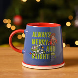 Toy Story Christmas porcelain mug in blue with red handle and interior, featuring Woody, Buzz Lightyear and an alien, set on a round coaster.