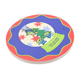 Round ceramic coaster from the Toy Story Christmas mug set, with a scalloped red and blue border featuring Little Green Aliens among stars and a Christmas tree, on a white background.