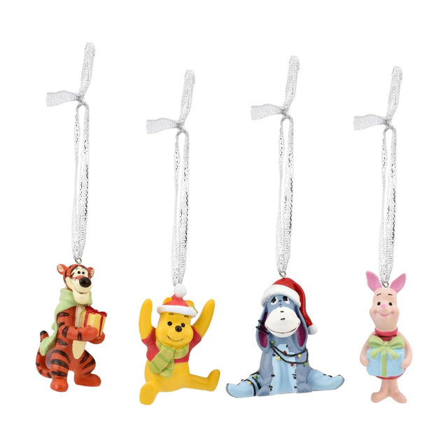 Set of 4 hand-painted resin Winnie the Pooh Christmas ornaments on silver ribbons, featuring Tigger with a gift, Pooh in a Santa hat, Eeyore with fairy lights, and Piglet.