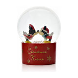 Mickey Mouse & Minnie Mouse Christmas Kisses Snow Globe in red, round glass dome with gold glitter, set on a red "Christmas Kisses" base with snowflake accents, shown on a plain white background.