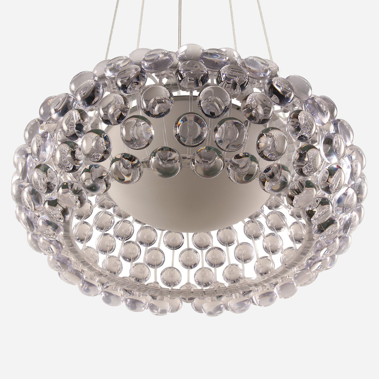 The Briller LED Large Suspension Light - Clear is a modern chandelier with a circular design that features multiple acrylic spheres surrounding a central LED light fixture, elegantly suspended by thin wires.