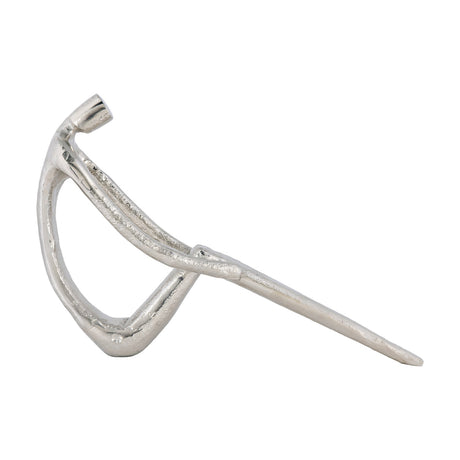 Zadiwin Sculpture in silver aluminium, an abstract seated figure with a looped body, small cylindrical head, and long slender outstretched legs, shown on a plain white background.