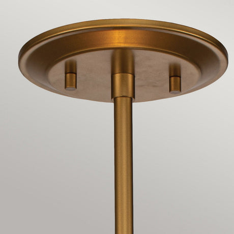 A detailed look at the Ziggy 1 Light Duo-Mount Small Pendant/Semi-Flush in a contemporary cylindrical design, featuring a lacquered gold ceiling canopy with two mounts for attaching a small pendant light. The versatile lighting solution stands out against the plain, light gray background.