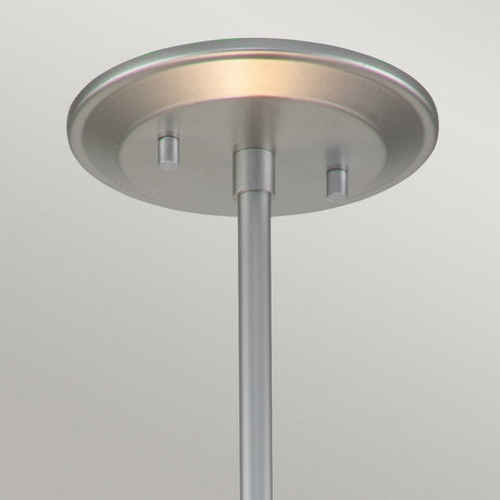 A close-up view of the Ziggy 2 Light Duo-Mount Medium Pendant/Semi-Flush in lacquered silver reveals a ceiling light fixture with a geometric pattern on its round base. A central rod extends downward, offering an adaptable lighting solution with its sleek, contemporary design and brushed metal finish.